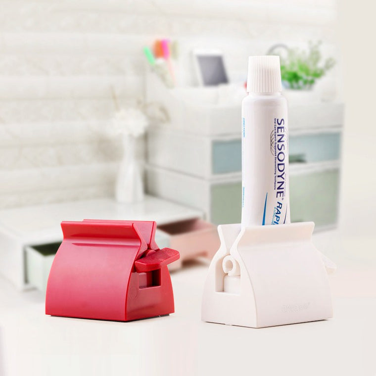 1PC Rolling Tube Toothpaste Squeezer Dispenser Toothpaste Seat Holder Stand Roller Bathroom Set Accessories