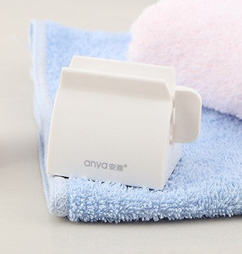 1PC Rolling Tube Toothpaste Squeezer Dispenser Toothpaste Seat Holder Stand Roller Bathroom Set Accessories